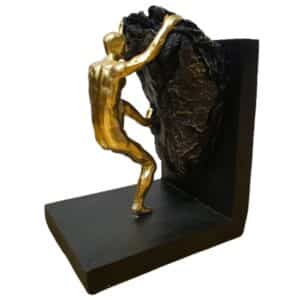 תומך ספרים "איש מוזהב מטפס על סלע" - סמל להתמודדות ונחישות